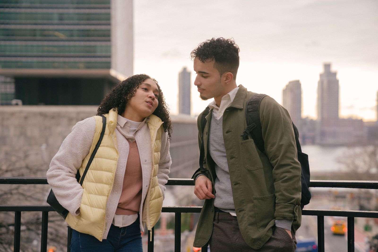 Two adults enjoying a conversation outdoors