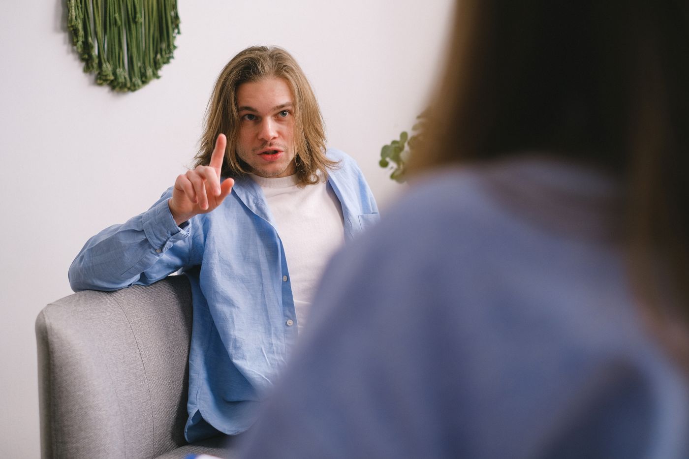 An adult asking questions during a conversation