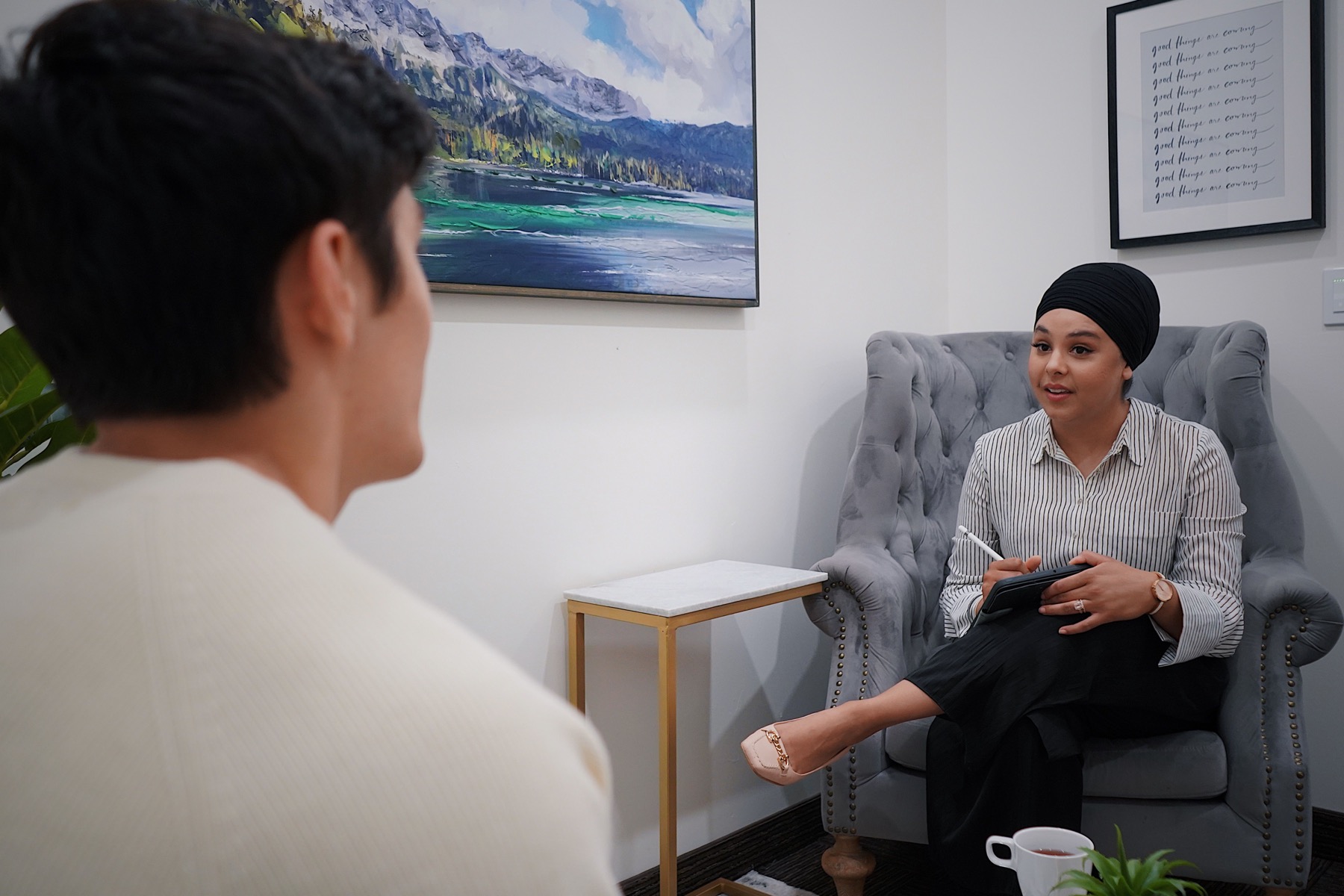 Two people talking during a private counseling appointment